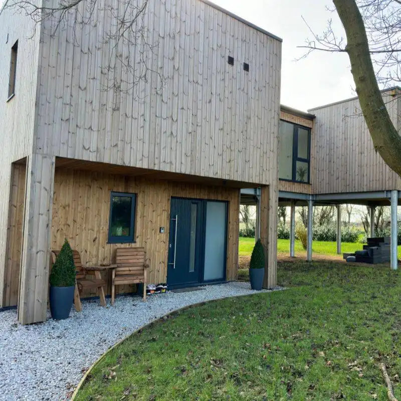 Contemporary grand designs home  with invisible iHelios infrared ceiling heating and no wall-mounted radiators.