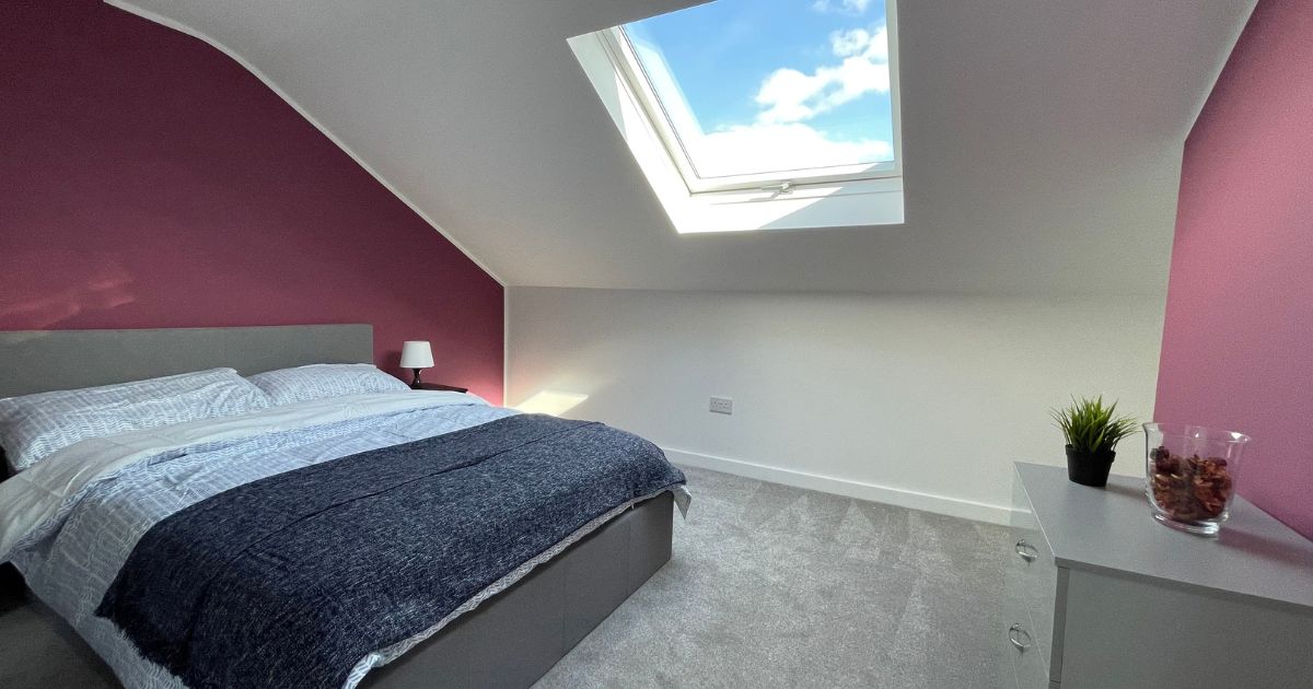 Bedroom with smart room-by-room infrared heating control.